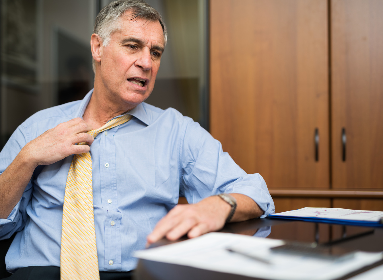 Businessman Sweating in His Office